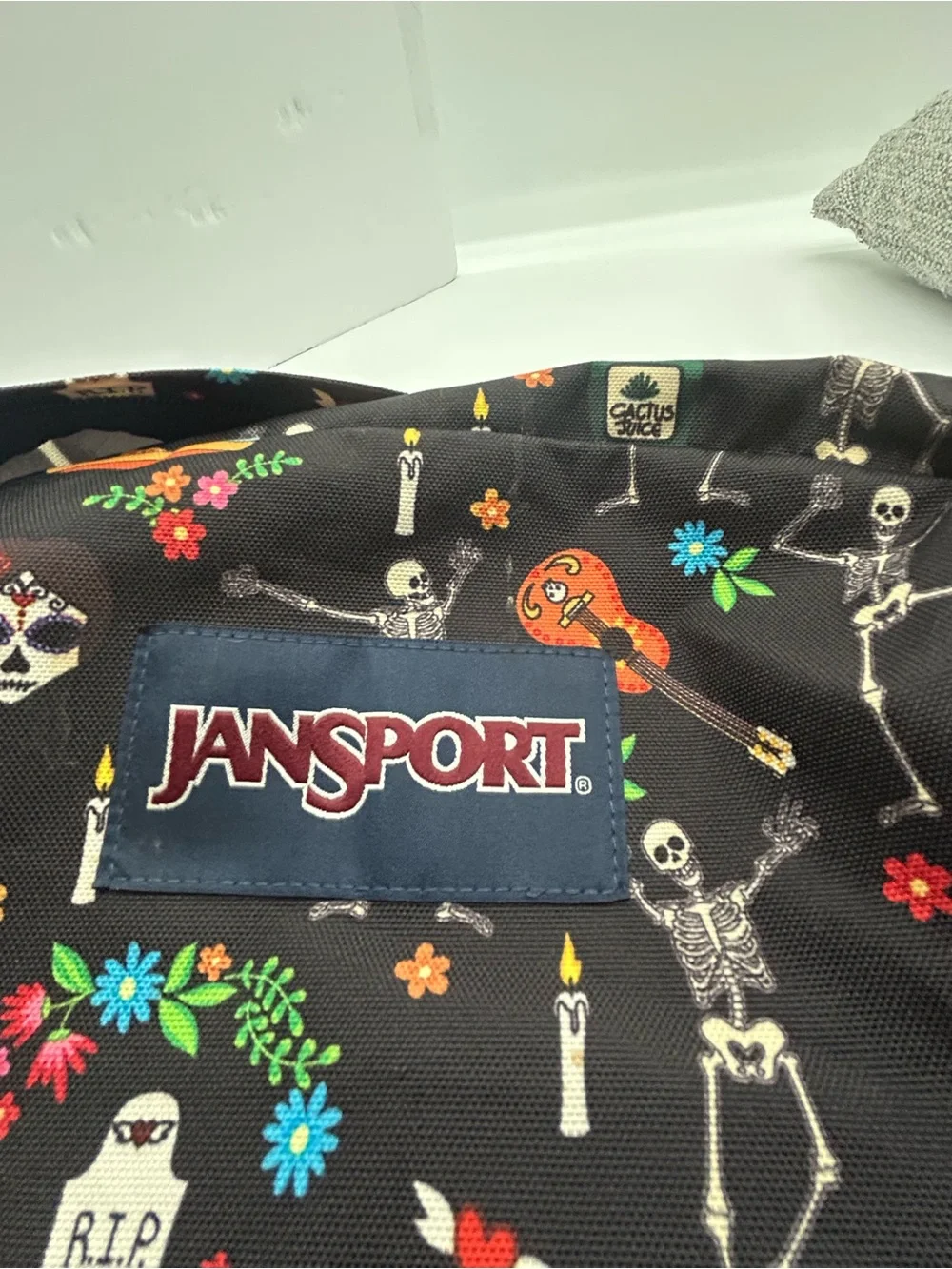Jansport Black Backpack with Colorful Day of the Dead Motif